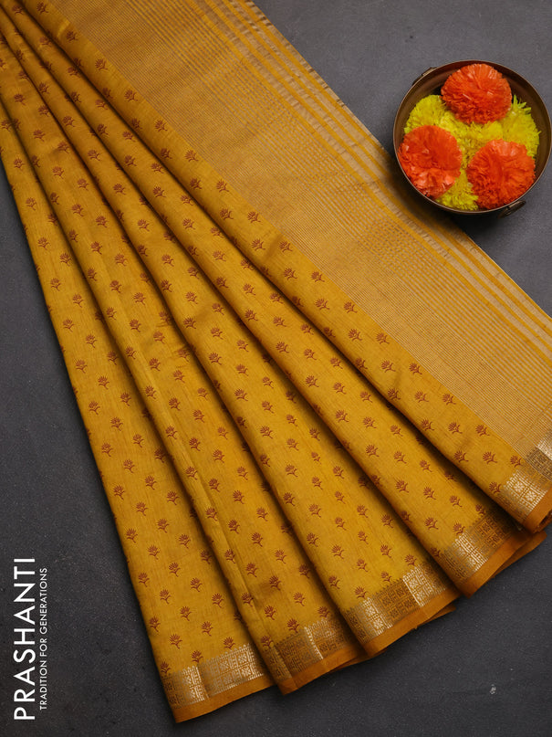 Semi raw silk saree mustard yellow with allover butta prints and zari woven border