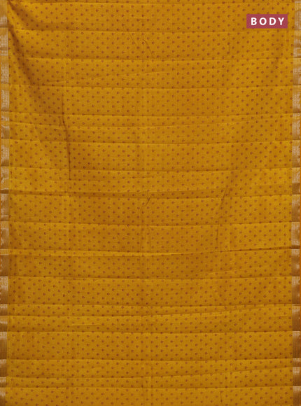 Semi raw silk saree mustard yellow with allover butta prints and zari woven border