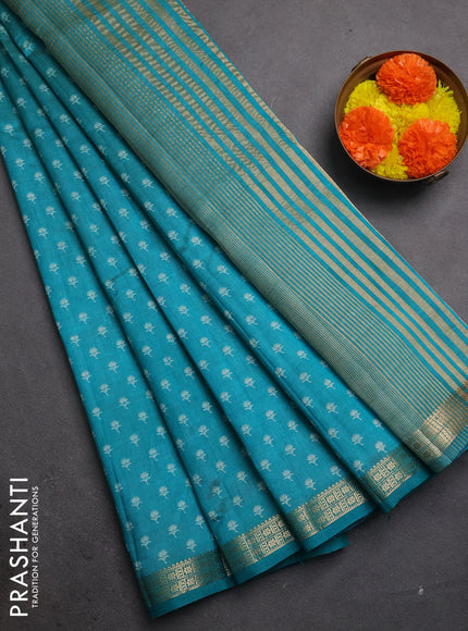 Semi raw silk saree teal green with allover butta prints and zari woven border