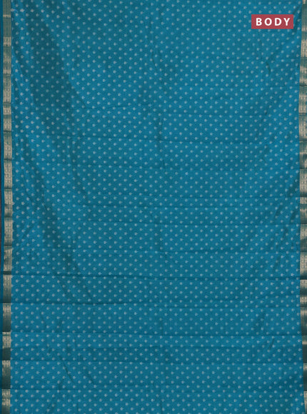 Semi raw silk saree teal green with allover butta prints and zari woven border