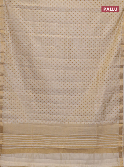 Semi raw silk saree cream with allover butta prints and zari woven border