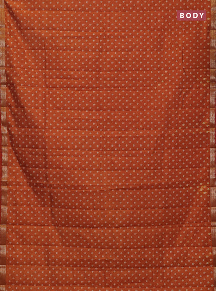 Semi raw silk saree rustic orange with allover butta prints and zari woven border