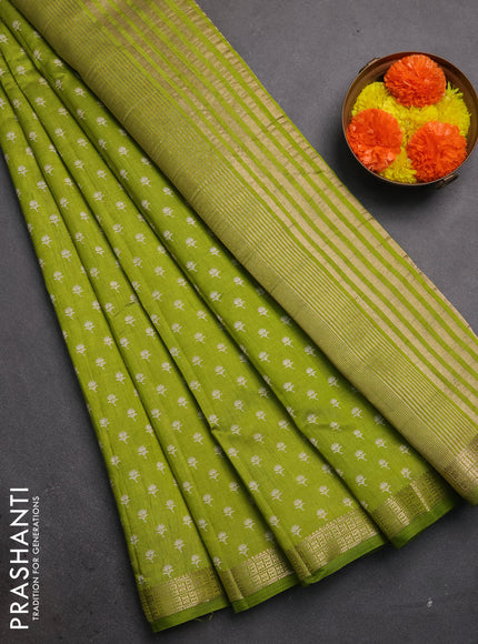 Semi raw silk saree light green with allover butta prints and zari woven border