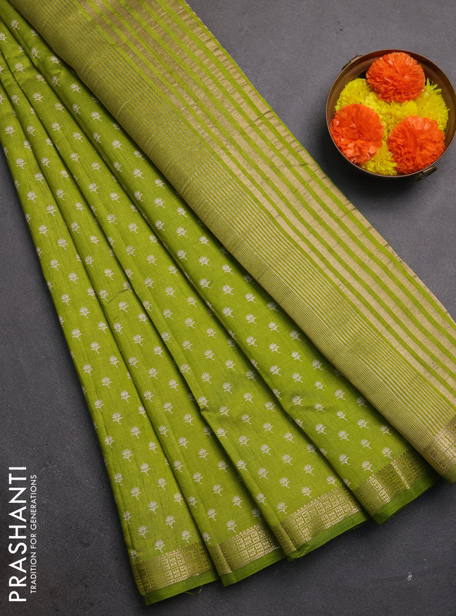 Semi raw silk saree light green with allover butta prints and zari woven border