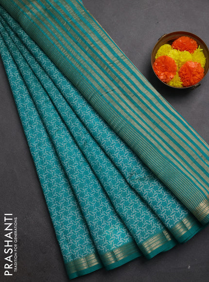 Semi raw silk saree teal green with allover geometric prints and zari woven border