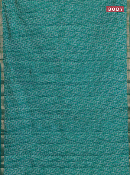 Semi raw silk saree teal green with allover geometric prints and zari woven border