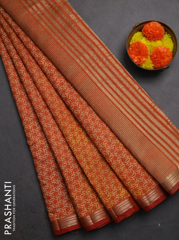Semi raw silk saree rustic orange with allover geometric prints and zari woven border