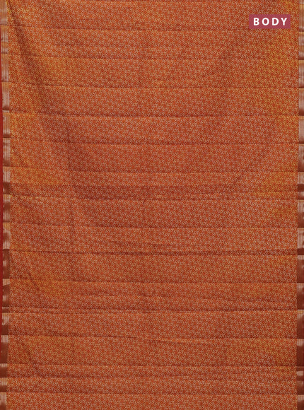 Semi raw silk saree rustic orange with allover geometric prints and zari woven border
