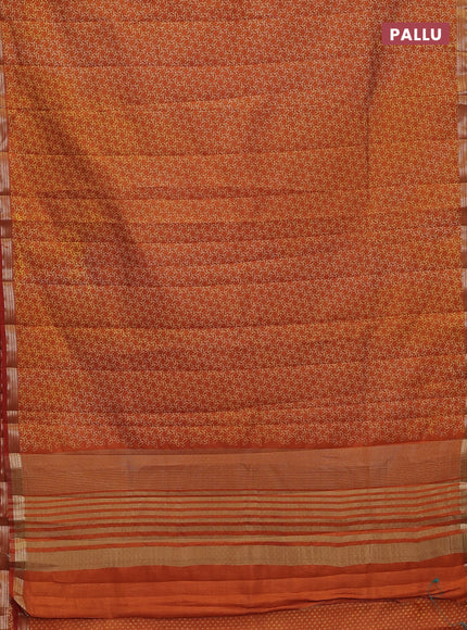 Semi raw silk saree rustic orange with allover geometric prints and zari woven border