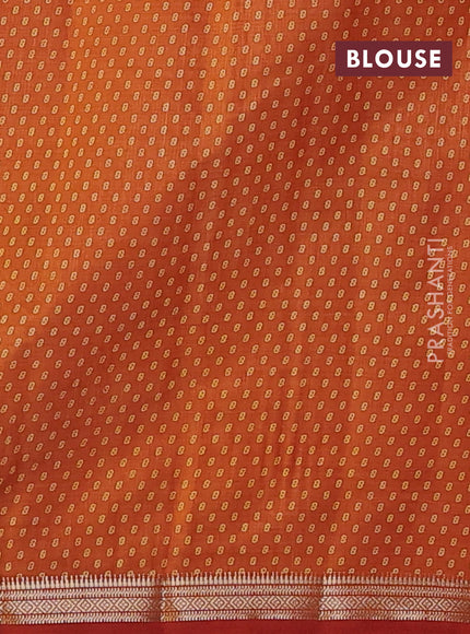 Semi raw silk saree rustic orange with allover geometric prints and zari woven border