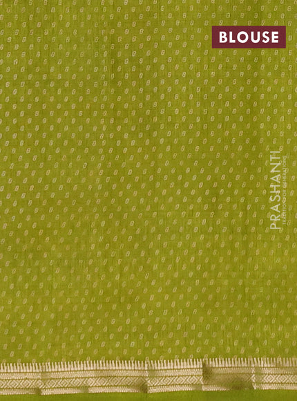 Semi raw silk saree light green with allover geometric prints and zari woven border