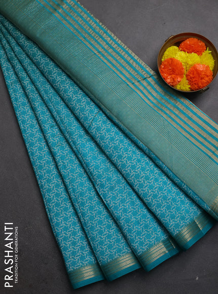 Semi raw silk saree peacock blue with allover geometric prints and zari woven border