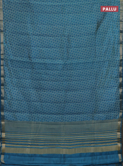 Semi raw silk saree peacock blue with allover geometric prints and zari woven border