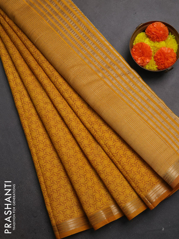 Semi raw silk saree dark mustard with allover geometric prints and zari woven border