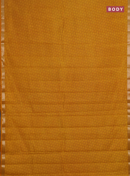 Semi raw silk saree dark mustard with allover geometric prints and zari woven border