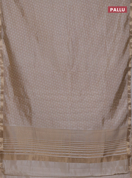 Semi raw silk saree cream with allover geometric prints and zari woven border