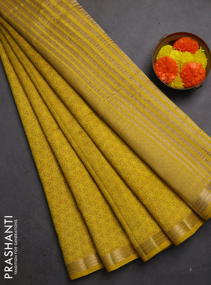 Semi raw silk saree mustard yellow with allover geometric prints and zari woven border