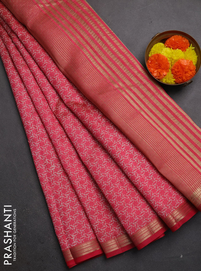 Semi raw silk saree pink shade with allover geometric prints and zari woven border