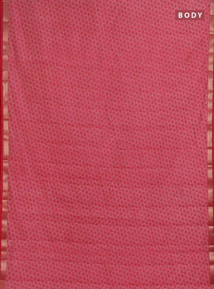 Semi raw silk saree pink shade with allover geometric prints and zari woven border