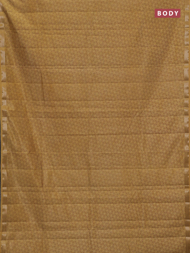 Semi raw silk saree sandal with allover geometric prints and zari woven border