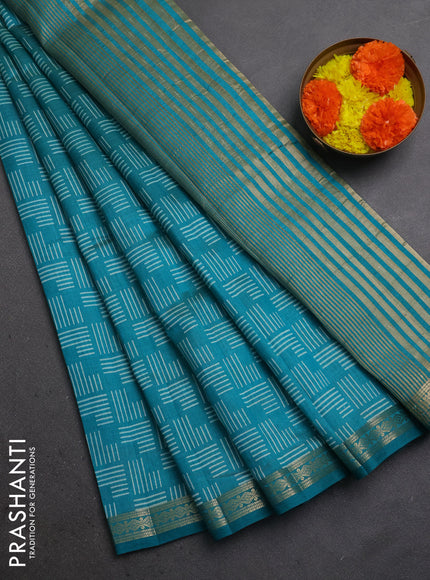 Semi raw silk saree teal green with allover geometric prints and zari woven border