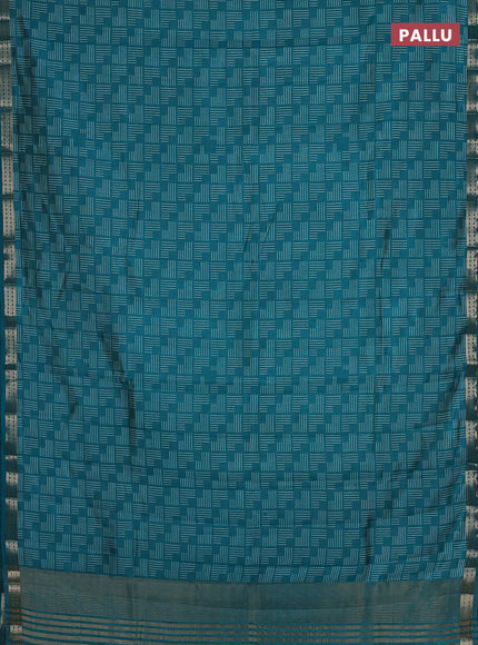 Semi raw silk saree teal green with allover geometric prints and zari woven border