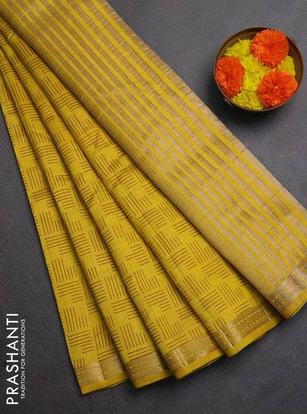 Semi raw silk saree mustard yellow with allover geometric prints and zari woven border