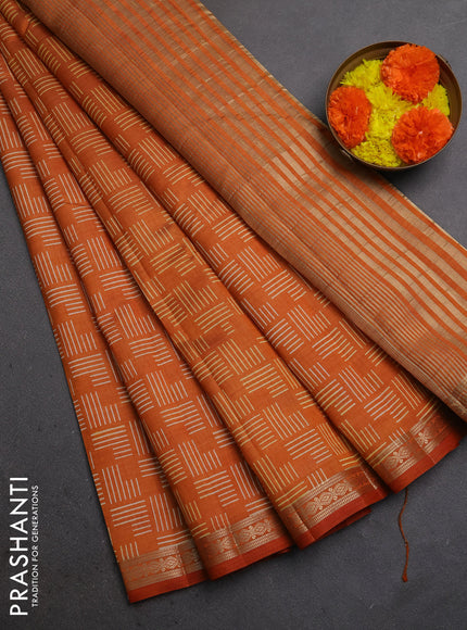 Semi raw silk saree rustic orange with allover geometric prints and zari woven border