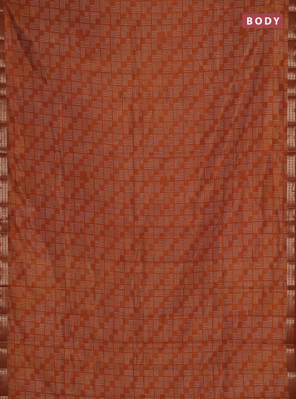 Semi raw silk saree rustic orange with allover geometric prints and zari woven border