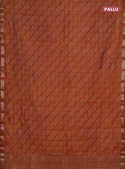 Semi raw silk saree rustic orange with allover geometric prints and zari woven border
