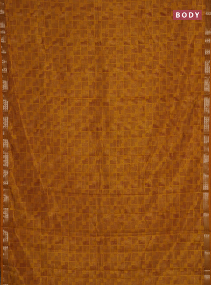 Semi raw silk saree dark mustard with allover geometric prints and zari woven border
