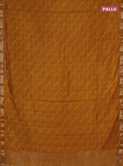 Semi raw silk saree dark mustard with allover geometric prints and zari woven border