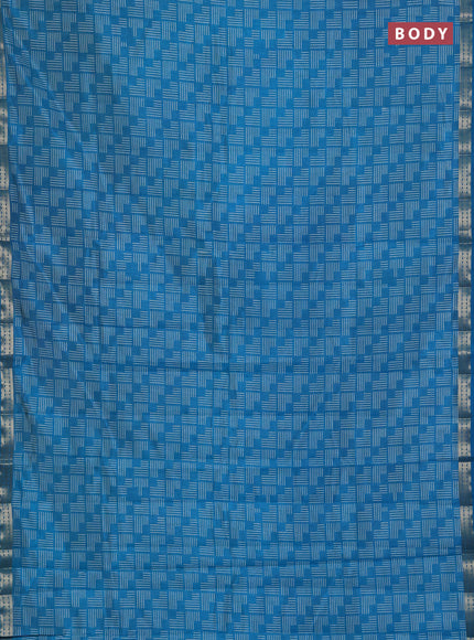 Semi raw silk saree teal blue with allover geometric prints and zari woven border