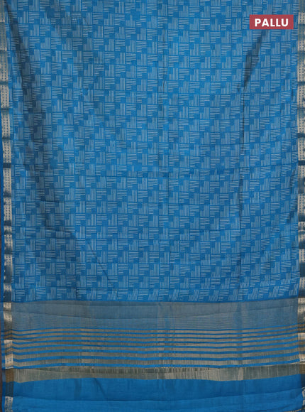 Semi raw silk saree teal blue with allover geometric prints and zari woven border