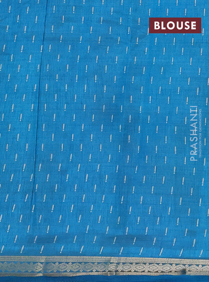 Semi raw silk saree teal blue with allover geometric prints and zari woven border