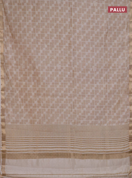 Semi raw silk saree cream with allover geometric prints and zari woven border