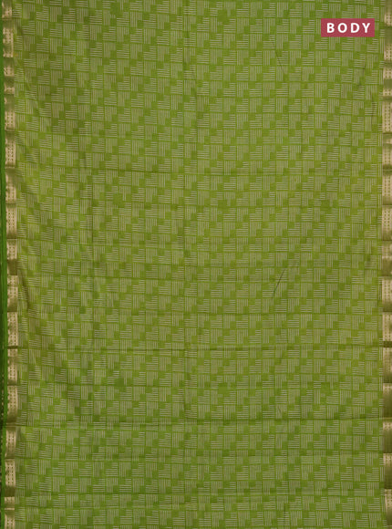 Semi raw silk saree light green with allover geometric prints and zari woven border