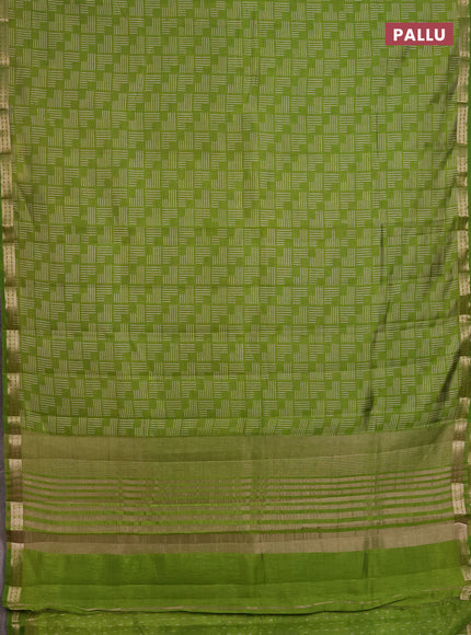 Semi raw silk saree light green with allover geometric prints and zari woven border