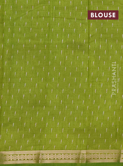 Semi raw silk saree light green with allover geometric prints and zari woven border