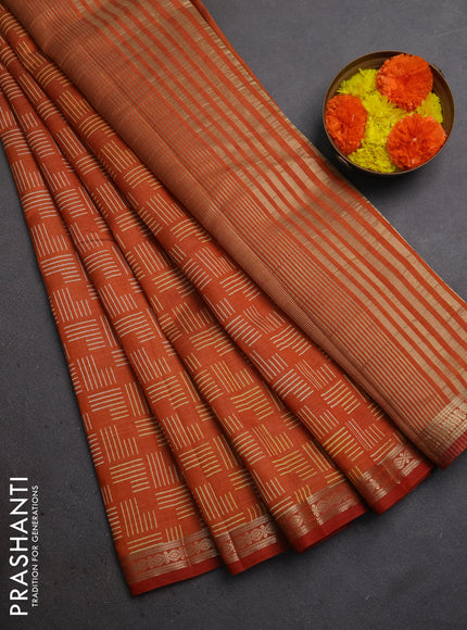 Semi raw silk saree rustic orange with allover geometric prints and zari woven border