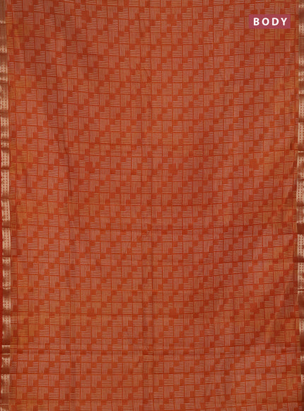Semi raw silk saree rustic orange with allover geometric prints and zari woven border