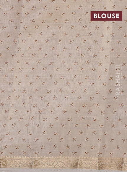Semi raw silk saree cream with allover prints and zari woven border