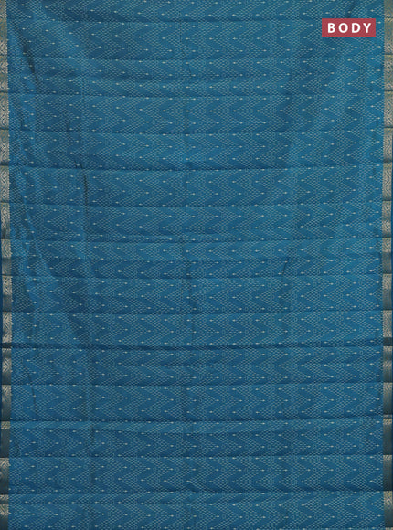Semi raw silk saree teal blue with allover prints and zari woven border