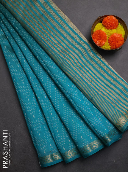 Semi raw silk saree teal green with allover prints and zari woven border