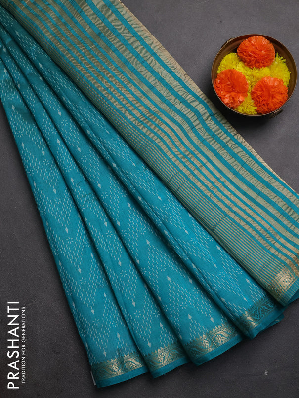 Semi raw silk saree teal green with allover prints and zari woven border
