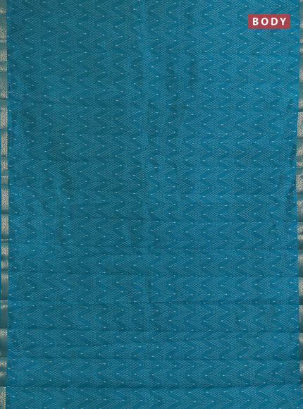Semi raw silk saree teal green with allover prints and zari woven border