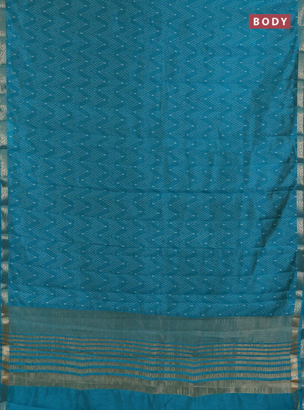 Semi raw silk saree teal green with allover prints and zari woven border