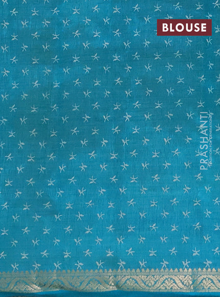 Semi raw silk saree teal green with allover prints and zari woven border