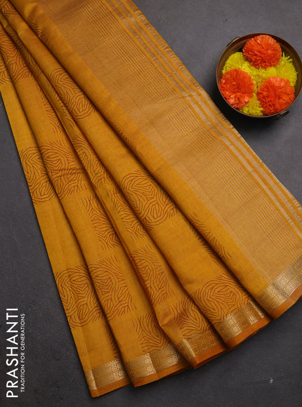 Semi raw silk saree dark mustard with allover box style butta prints and small zari woven border