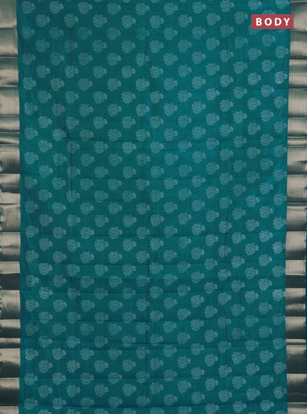 Semi raw silk saree teal blue with allover floral butta prints and zari woven border